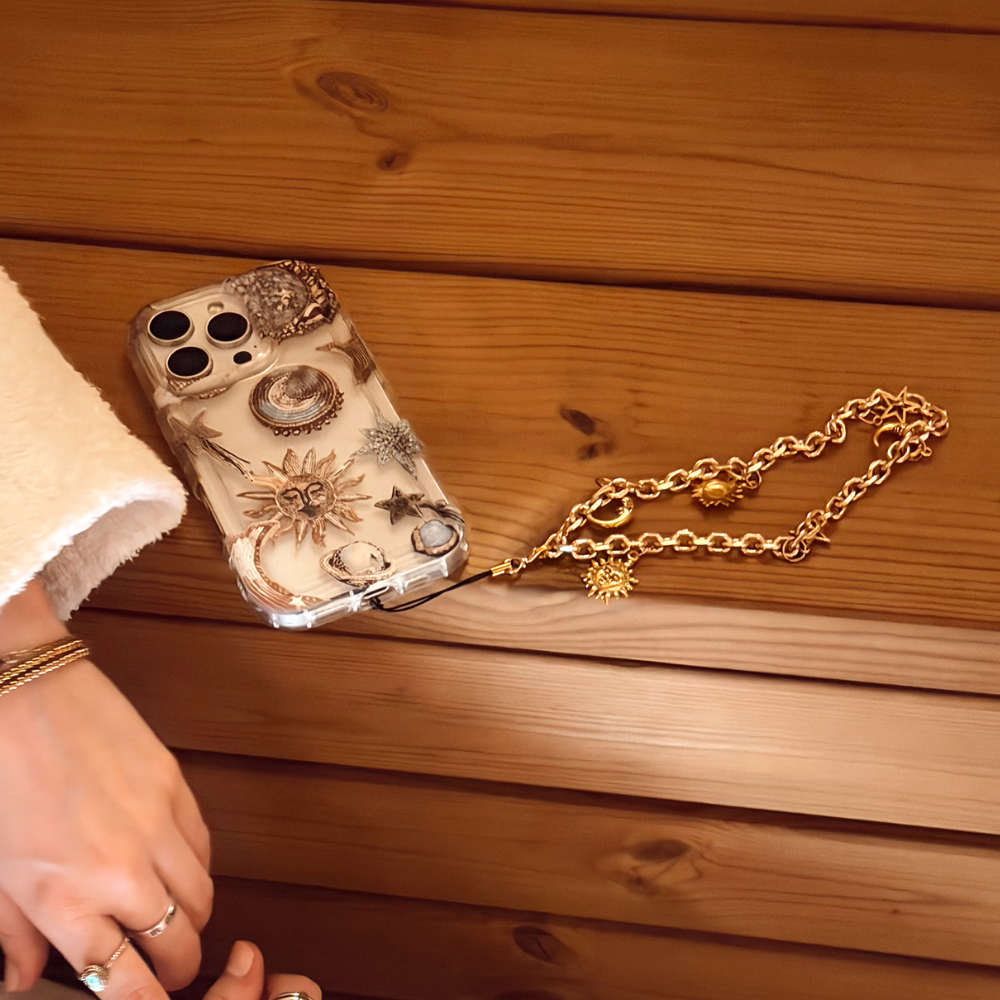Pastel Celestial Phone Case with Celestial Phone Strap attached in sauna setting