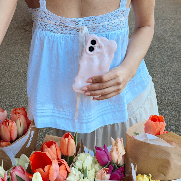 Girl tulip flower stall close up image of the 3D Bubble Phone Case in Powder Pink