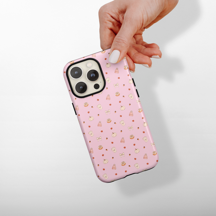 Autumn treats on a pastel pink background.