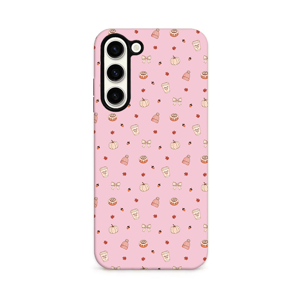 Autumn treats on a pastel pink background.