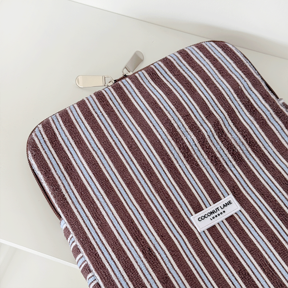 Brown, white and blue striped iPad Sleeve with silver zip and Coconut Lane logo badge.