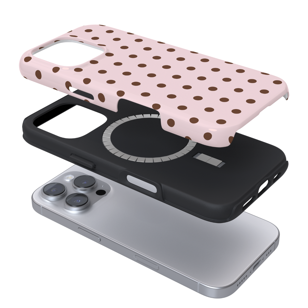 Baby pink phone case with chocolate brown polka dots.