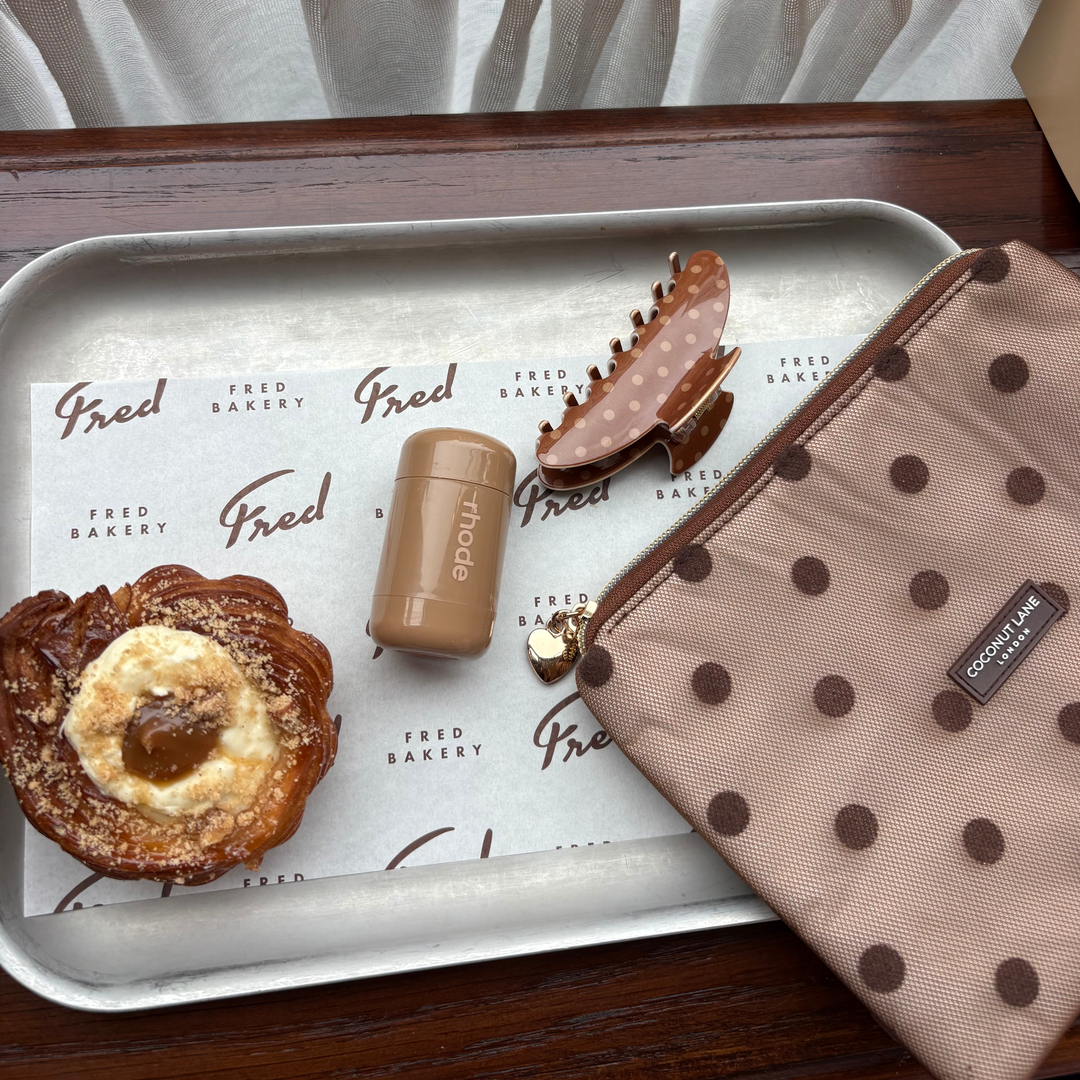 sheer mesh polka dot Dot Society Chocolate Brown Everything Pouch alongside the matching claw clip. 