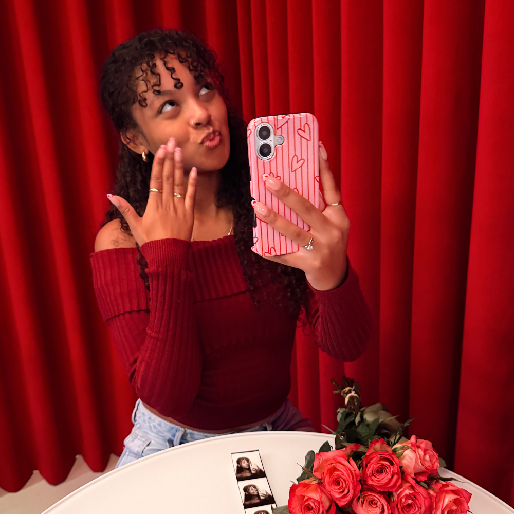 Blowing kisses selfie with Kissing Booth Phone Case