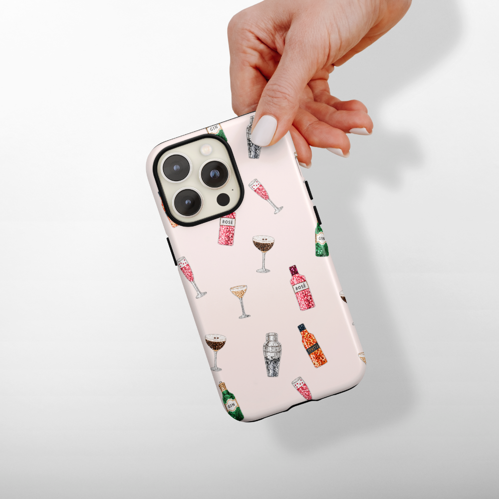 Festive drinks on a pale pink background phone case.