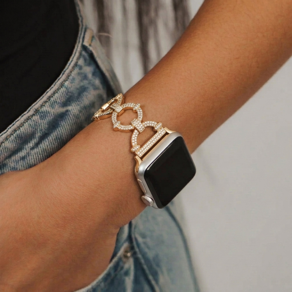 girl wearing diamante bracelet watch strap on her wrist in jean pocket