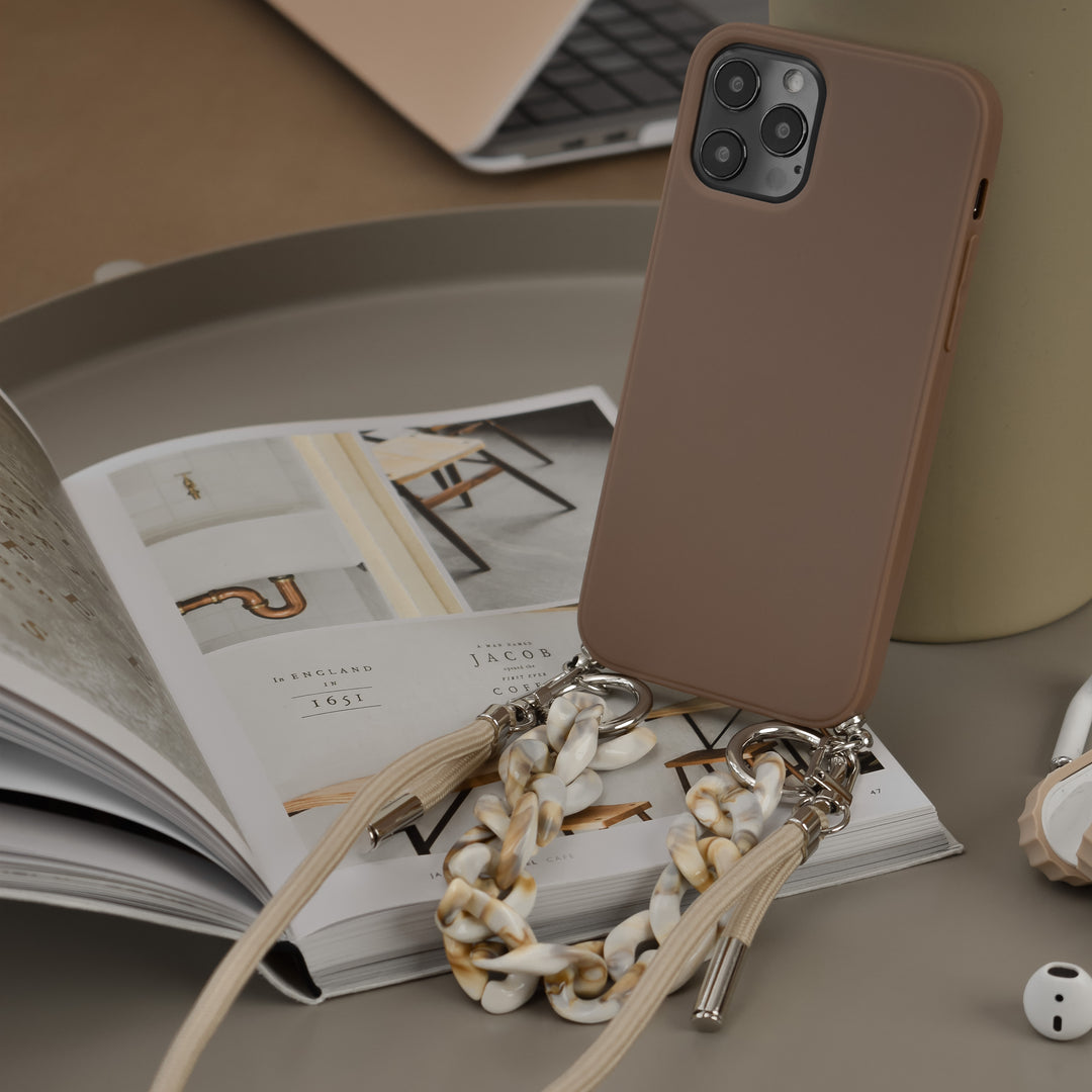 Brown-apple-phone-case-with-nude-short-chain-strap-and-nude-long-lanyard-strap