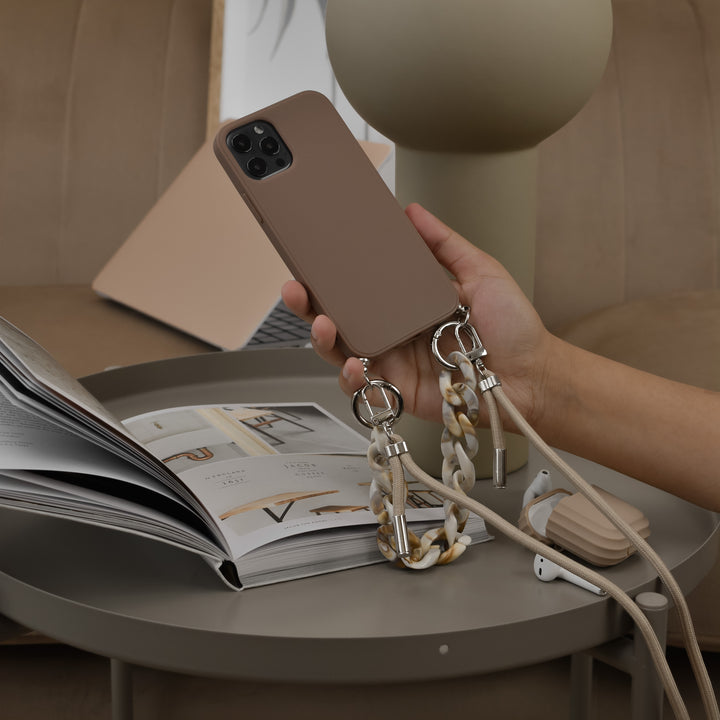 Brown-apple-phone-case-with-nude-short-chain-strap-and-nude-long-lanyard-strap