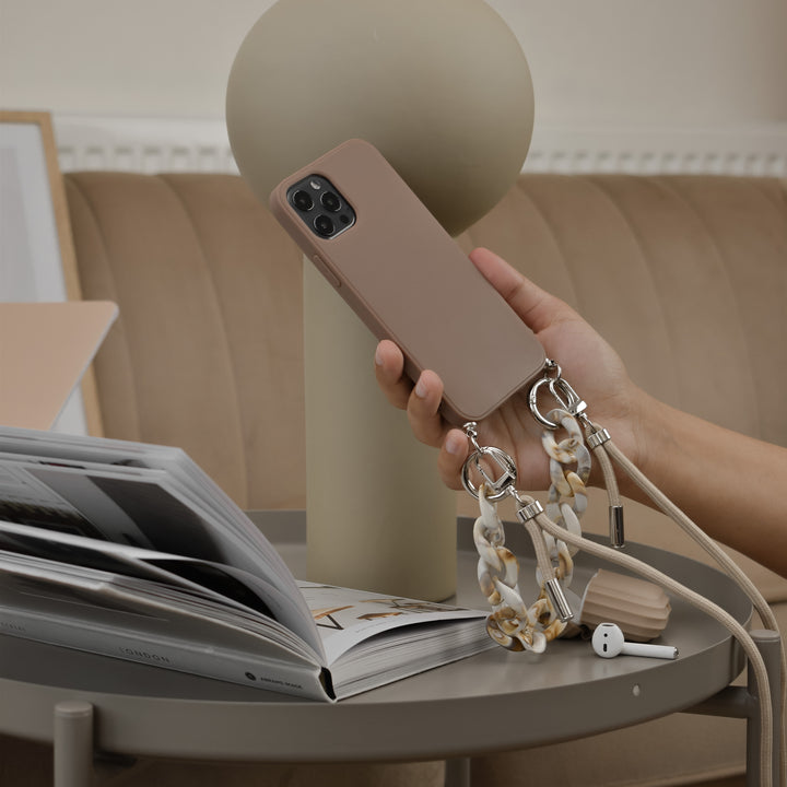 Brown-apple-phone-case-with-nude-short-chain-strap-and-nude-long-lanyard-strap